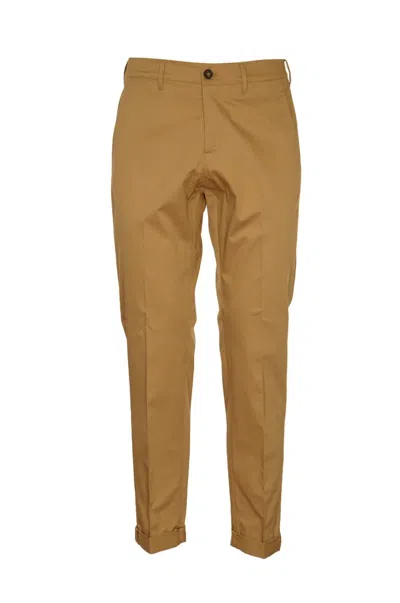 Shop Golden Goose Trousers Beige