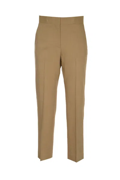 Shop Msgm Trousers In Sand