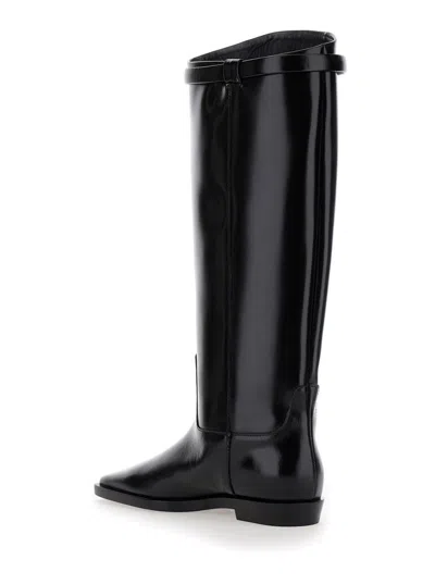 Shop Totême 'the Riding Boot' Black Knee-high Boots With Embossed Logo In Leather Woman