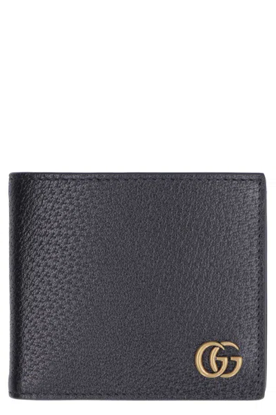 Shop Gucci Marmont Leather Flap-over Wallet In Black
