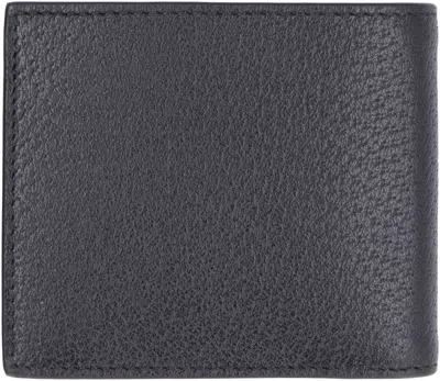 Shop Gucci Marmont Leather Flap-over Wallet In Black