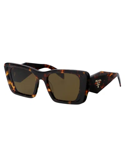 Shop Prada Sunglasses In Vau01t Honey Tortoise