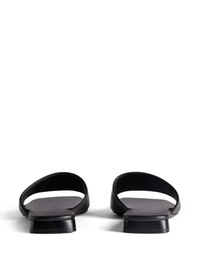 Shop Balenciaga "duty Free" Leather Slides In Black
