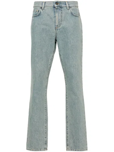 Shop Moschino Straight Jeans With A Faded Effect