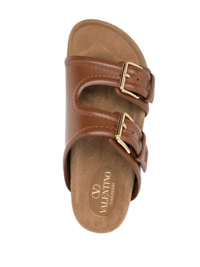 Shop Valentino Garavani Vlogo-logo Leather Sandals In Brown