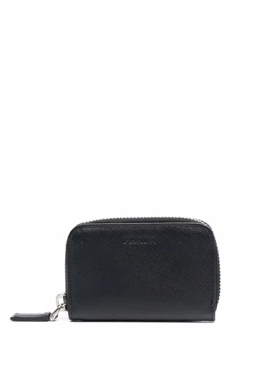 Shop Prada Debossed-logo Textured-finish Wallet In Black