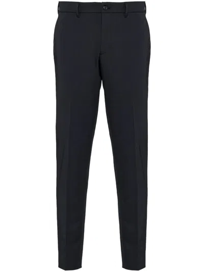 Shop Prada Tailored Skinny-cut Trousers In Nero