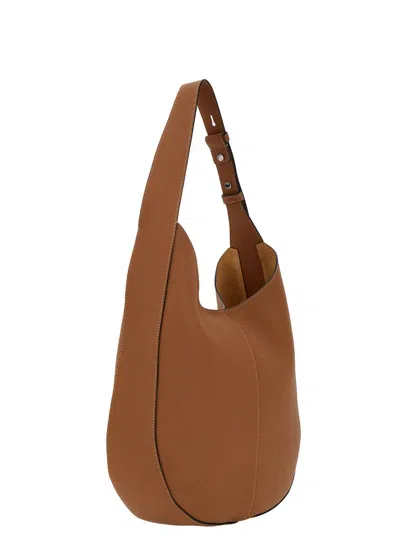 Shop Tod's Brown Hobo Handbag With Tonal Embossed Logo In Grainy Hammered Woman In Beige