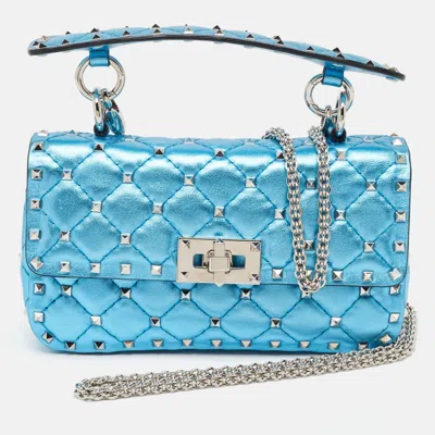 Shop Valentino Metallic Quilted Leather Small Rockstud Spike Top Handle Bag In Blue