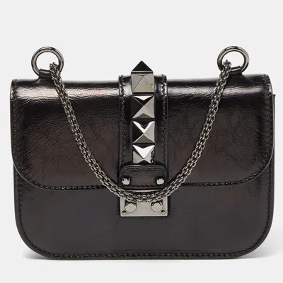 Shop Valentino Leather Small Rockstud Glam Lock Flap Bag In Black