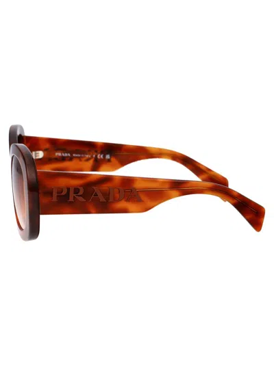 Shop Prada Sunglasses In 18r70e Cognac Tortoise