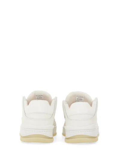 Shop Axel Arigato 'area Lo' White Sneakers With Embossed Logo In Leather Blend Woman