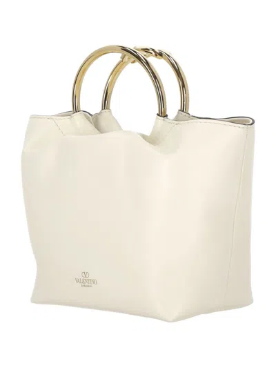 Shop Valentino Garavani Bucket Bags In Beige