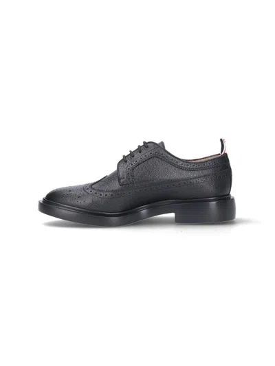 Shop Thom Browne Black Leather Longwing Brogues