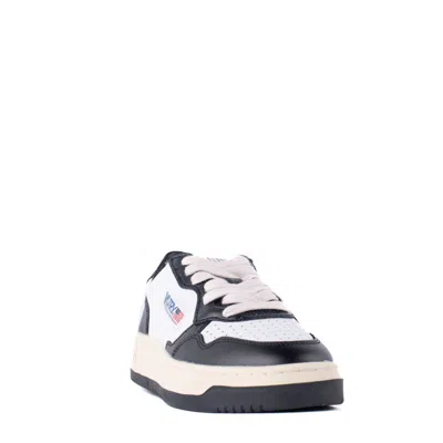 Shop Autry Black And White Leather Sneakers In White, Black