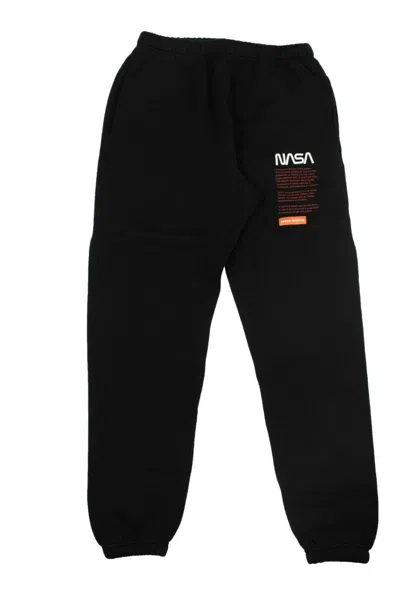 Shop Heron Preston Nasa Logo Sweatpants - Black