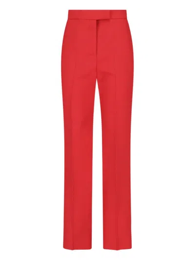 Shop Ferragamo Trousers In Red