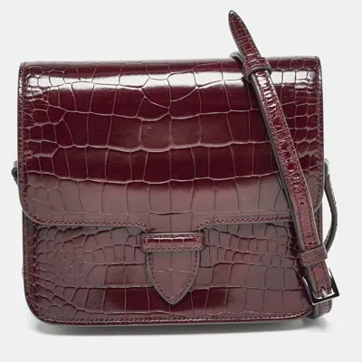 Shop Alaïa Alaia Embossed Leather Crossbody Bag In Red