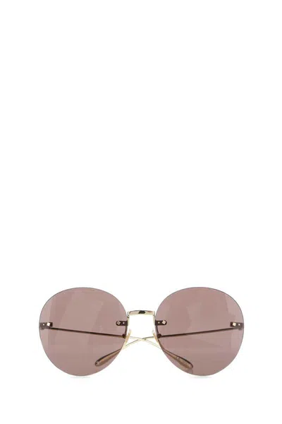 Shop Gucci Sunglasses In Gold