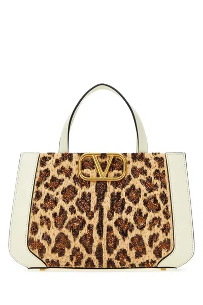 Shop Valentino Garavani Handbags. In Animal Print