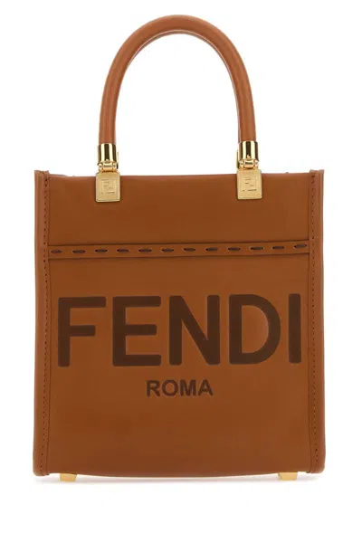 Shop Fendi Handbags. In Beige O Tan