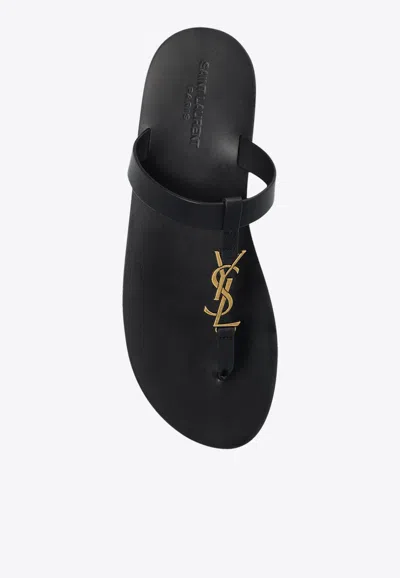 Shop Saint Laurent Cassandre Leather Thong Sandals In Black