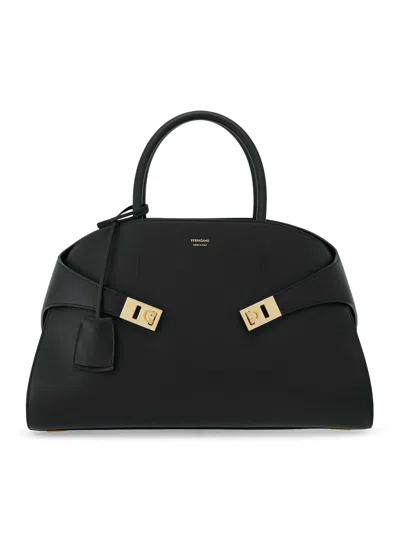 Shop Ferragamo Hug Handbag In Black