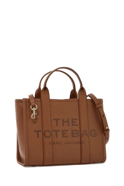 Shop Marc Jacobs The Leather Medium Tote Bag In 棕色的