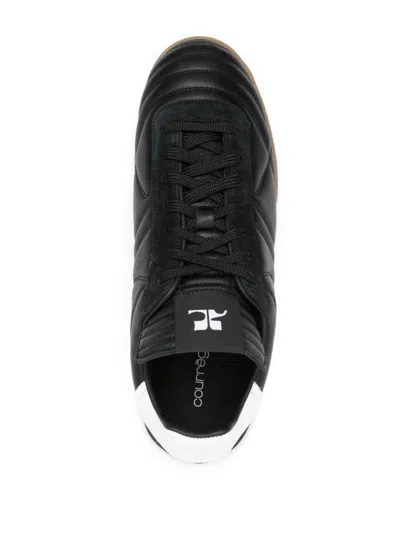 Courrèges Quilted Low Top Sneakers In Black