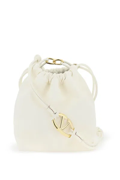 Shop Valentino Garavani Vlogo Pouf Bucket Bag With Women In Cream