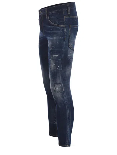 Dsquared2 'cool Guy' Blue Five Pocket Jeans With Distressed Effect And Logo Patch On The Back In Denim Blu Scuro