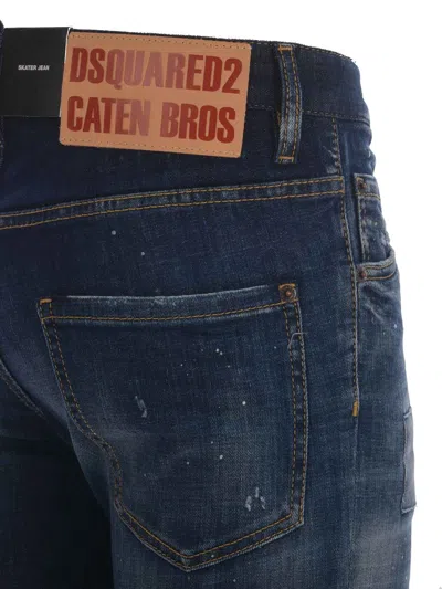 Dsquared2 'cool Guy' Blue Five Pocket Jeans With Distressed Effect And Logo Patch On The Back In Denim Blu Scuro