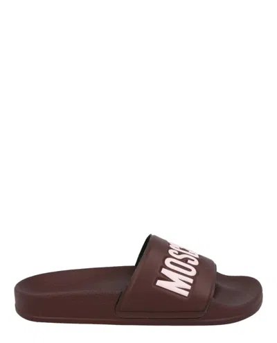 Shop Moschino Logo Lettering Pool Slides In Brown