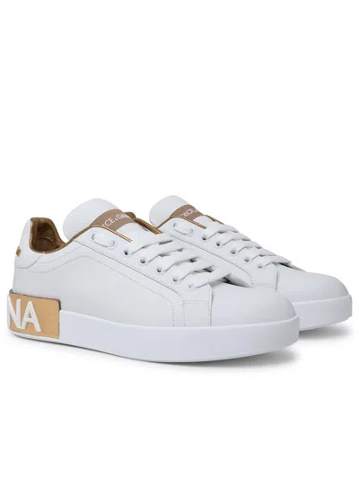 Shop Dolce & Gabbana White And Gold Leather Portofino Sneakers Woman