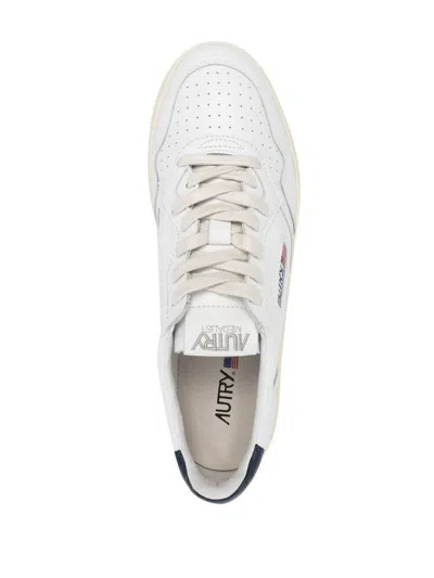 Shop Autry Sneakers In White/space