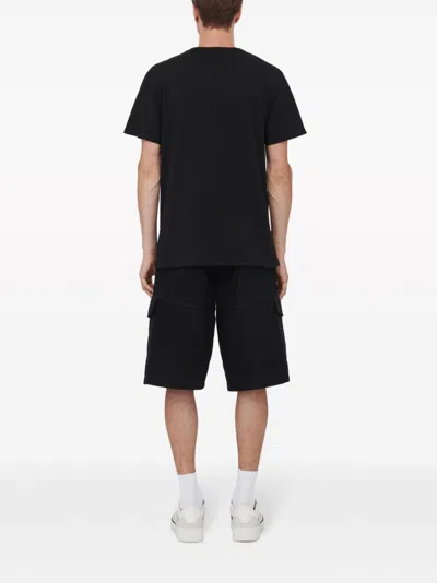 Shop Alexander Mcqueen Crystal Skull-print Cotton T-shirt For Men In Black