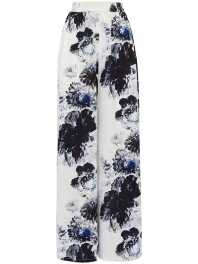 Shop Alexander Mcqueen Floral Printed Silk High-waisted Wide Leg Trousers In Blue