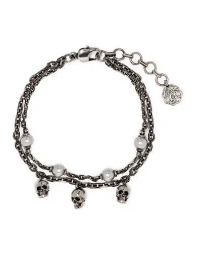Shop Alexander Mcqueen Layered Skull Charm Bracelet For Women In Golden