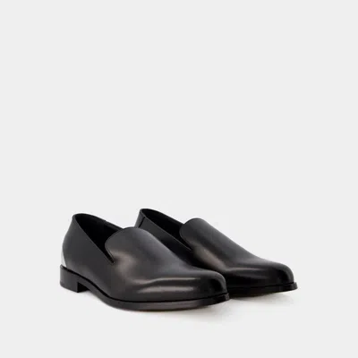 Shop Alexander Mcqueen Men's Metal Heel Loafers For Ss24 In Black