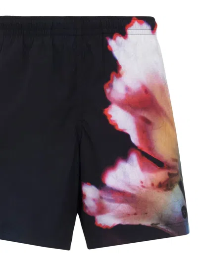 Shop Alexander Mcqueen Solarised Floral Print Swim Shorts For Men In Black