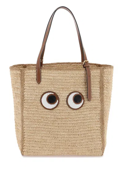 Shop Anya Hindmarch Iconic Eyes Raffia Tote Handbag In Beige
