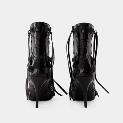 Shop Balenciaga Cagole Bootie H90 Ankle Boots In Black