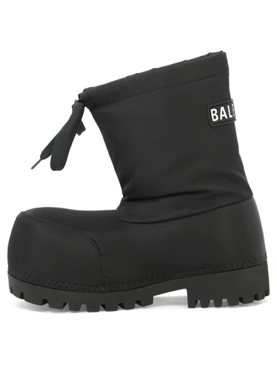 Shop Balenciaga Exaggerate Your Style With These Sleek Black Ski Boots