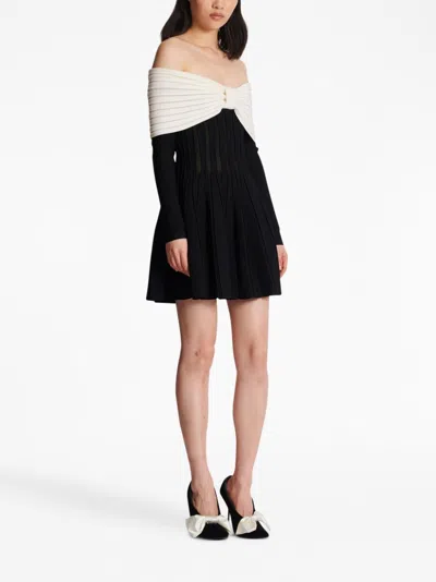 Shop Balmain Black Off-shoulder Knit Dress With Two-tone Colorblock And Pleated Skirt