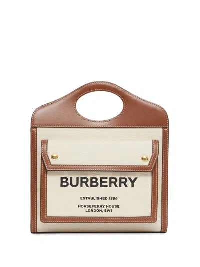 Shop Burberry Cream And Brown Canvas And Leather Handbag With Front Pocket And Adjustable Strap