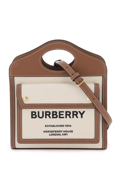 Shop Burberry Cream And Brown Canvas And Leather Handbag With Front Pocket And Adjustable Strap