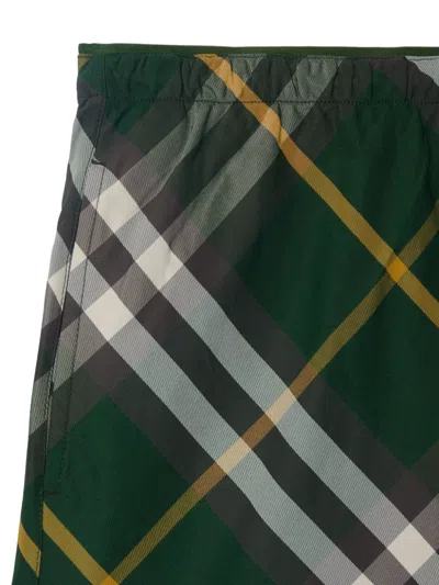 Shop Burberry Green Checkered Swim Shorts For Men