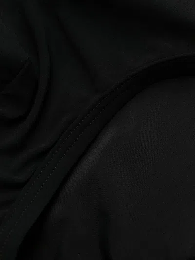 Shop Dolce & Gabbana Bold Logo Plaque Swim Trunks For Men In Black