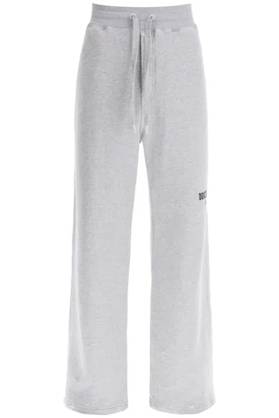 Shop Dolce & Gabbana Distressed Cotton Joggers With Small Prints For Men In Grey