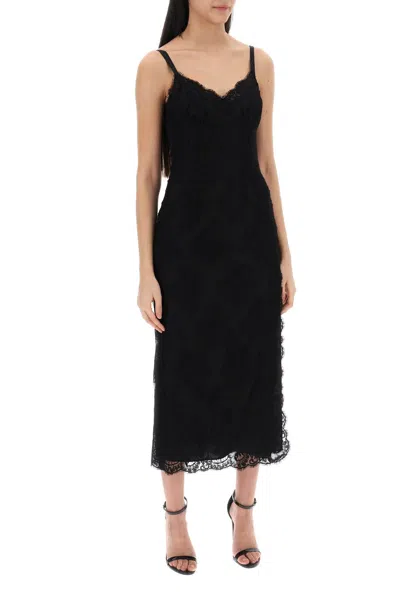 Shop Dolce & Gabbana Fitted Lace Midi Dress With Slit For Women In Black